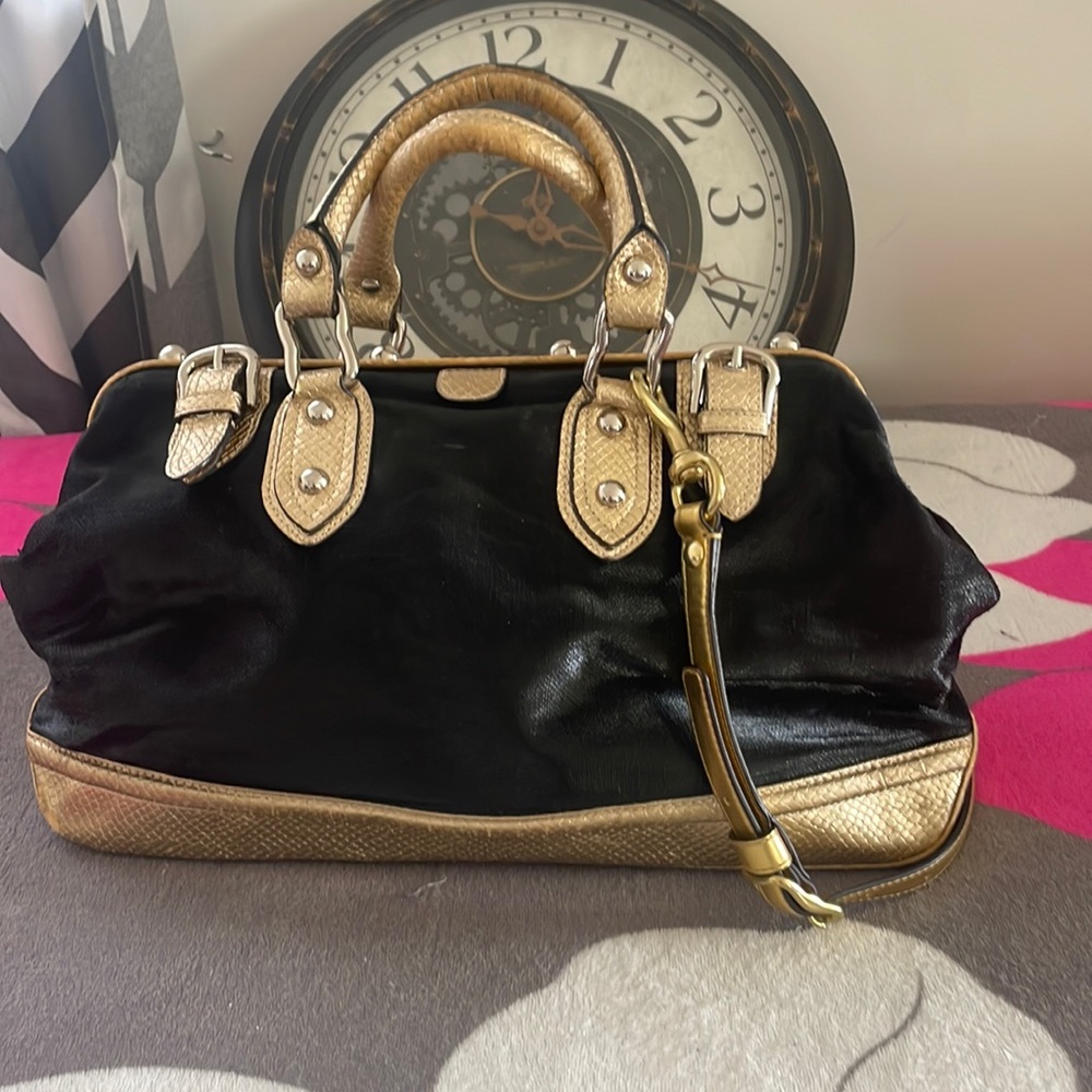 Maxx New York gold and black purse